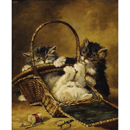 Three kittens playing in a sewing basket