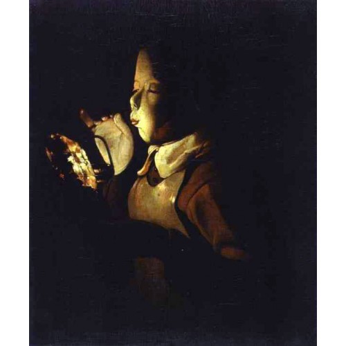 Boy blowing at a Lamp