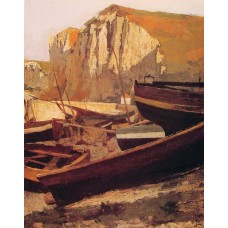 Boats at the foot of a cliff in Normandy