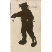 Silhouette of a man with a rake