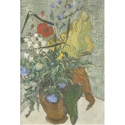 Wild flowers and thistles in a vase